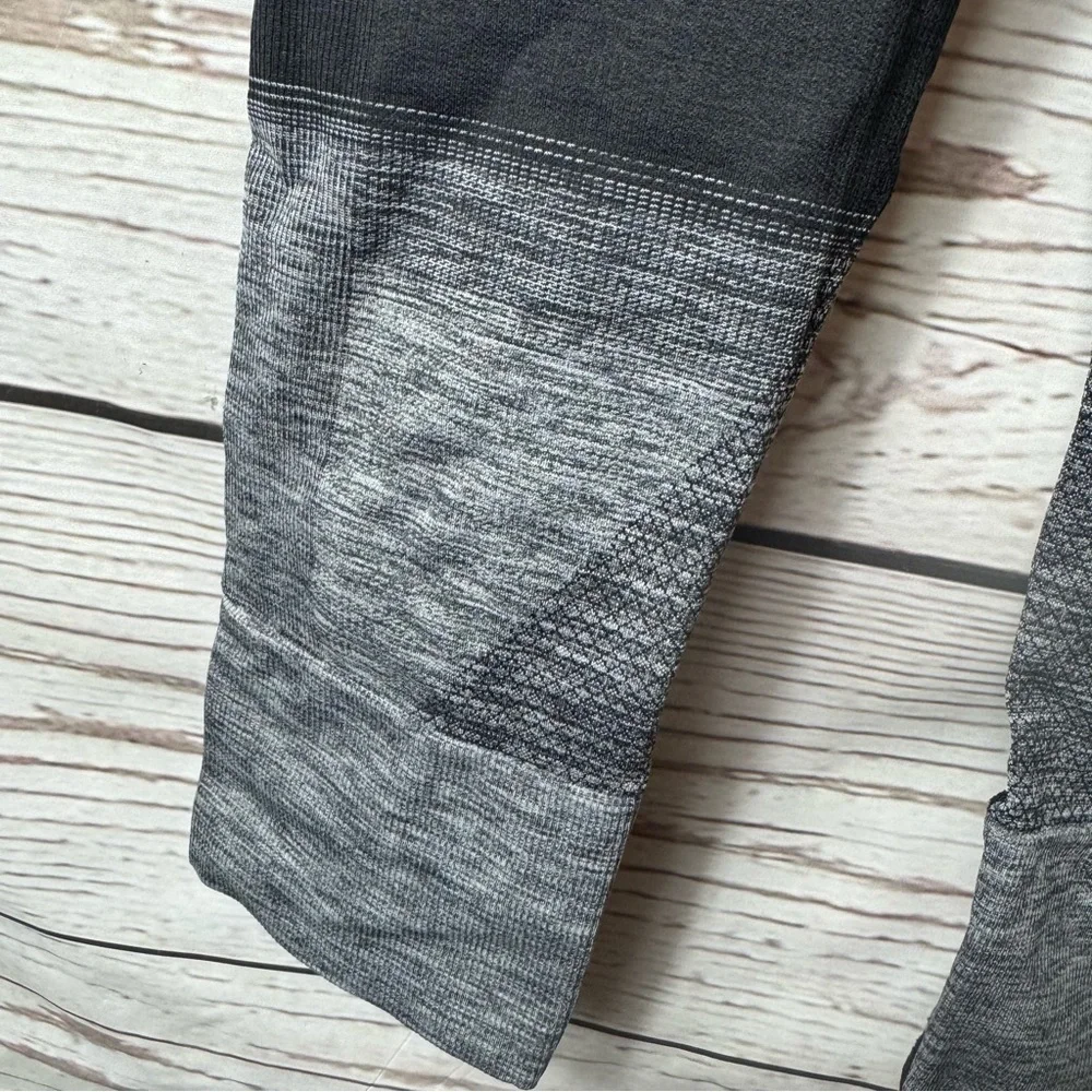 Lululemon Ebb To Street Seamlessly Street Crop Pant Heathered Black Size 4